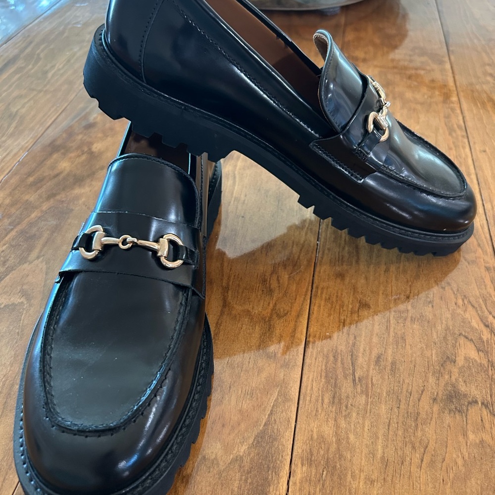 Women’s  Black Lug Sole Loafers with Gold Detailing